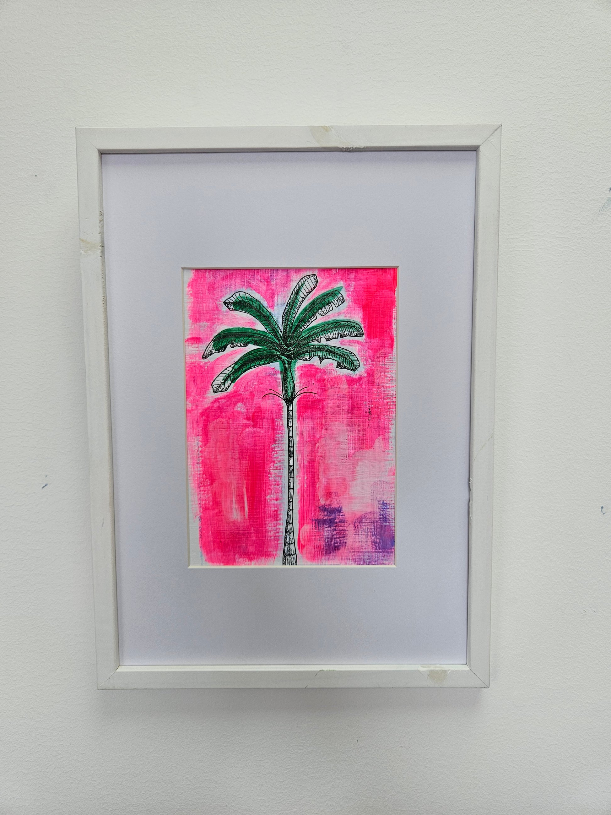 Palm tree illstration on neon pink acrylic background. White mount with white frame.