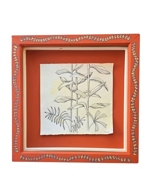 A square framed botanical art print featuring a black ink sketch of leaves and stems on textured cream paper, set within a terracotta orange frame which has a handpainted border