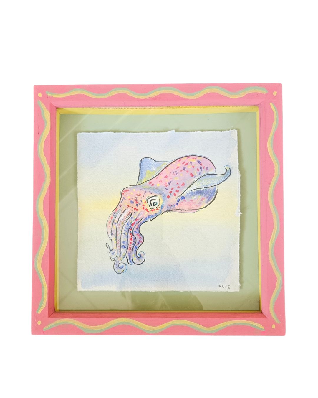 Square pink frame with wiggly lines and a painting of a small octopus inside