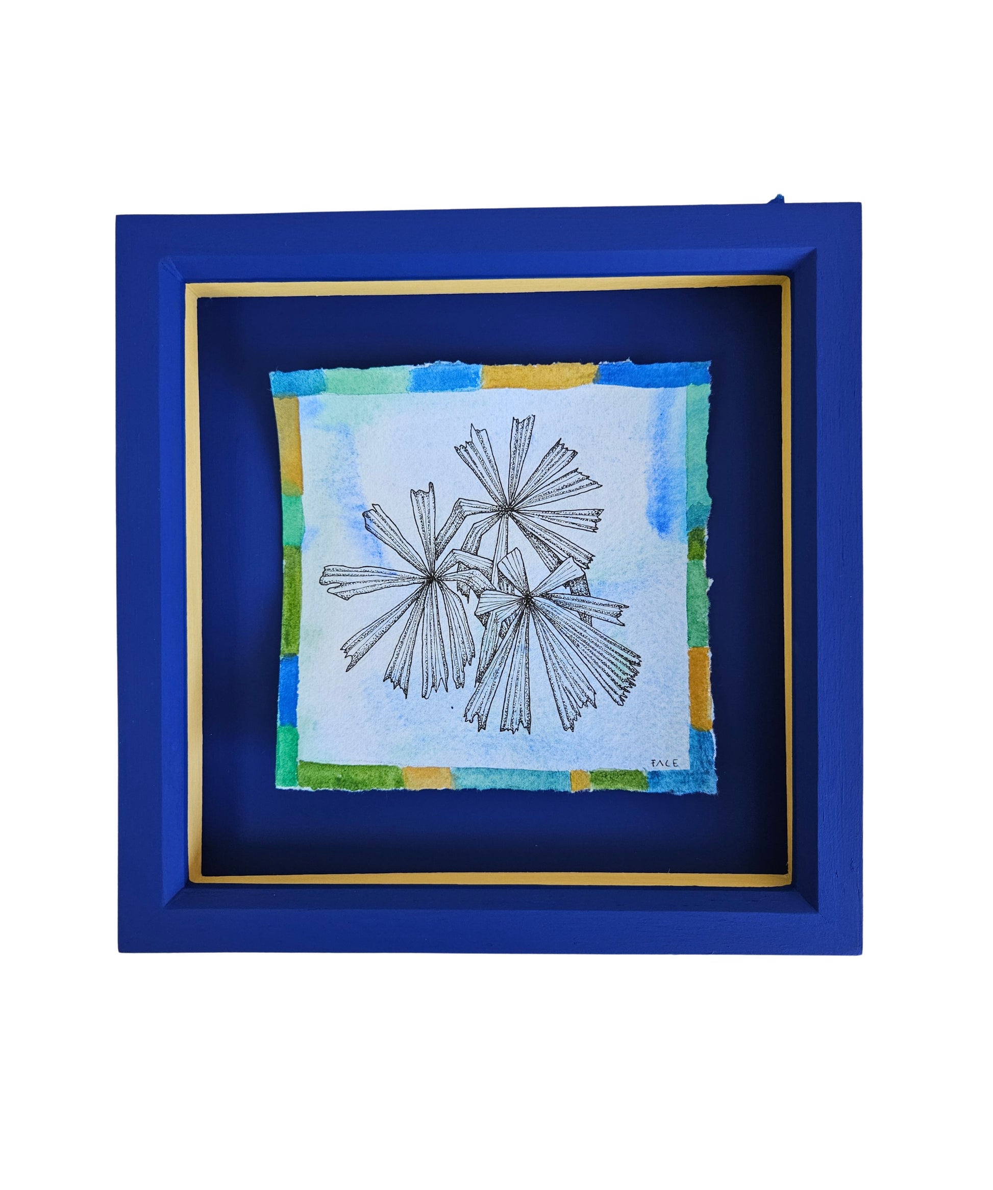 Framed artwork of palm leaves with a blue border and in a blue frame