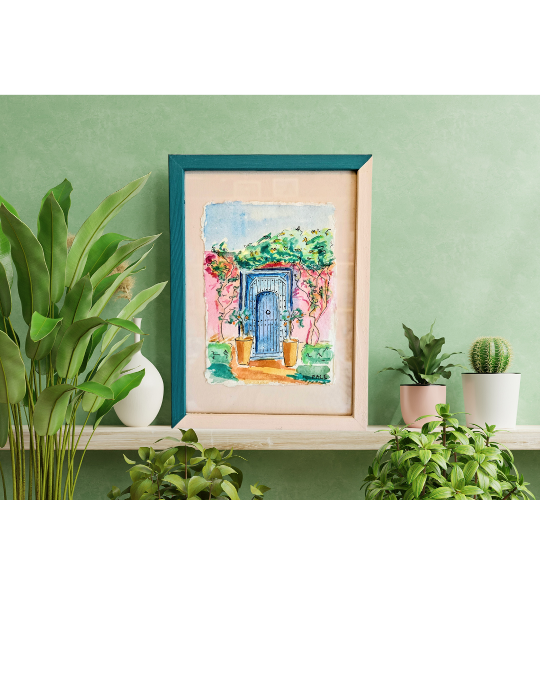 Framed artwork of a colorful door on a green wall with plants around