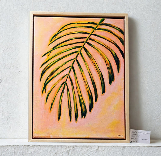 painting of a palm leaf on a pink background